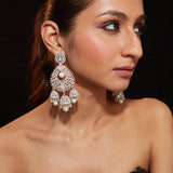 Rhodium Plated Zircon Studded With Pearl Drop Jhumka Dangle Earrings