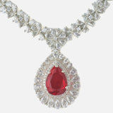 Rhodium Plated Zircon Studded With Red Synthetic Stone Pendant Necklace & Drop Earrings Set