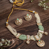 Isvaraah 2.0 Gold Plated Green Choker Necklace Set with Pair of Earrings